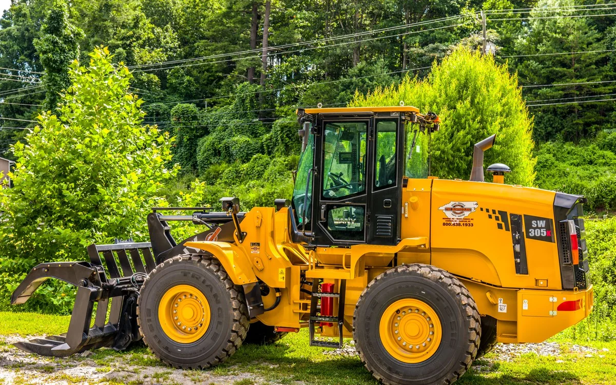 Yellow wheel loader ready for material-handling work